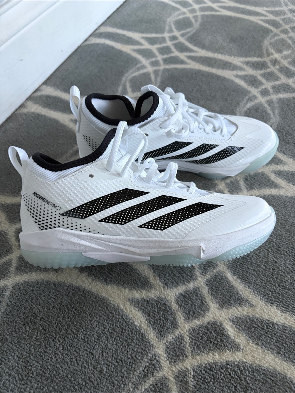 New without tags.  adidas adizero instinct 2.0 turf shoes